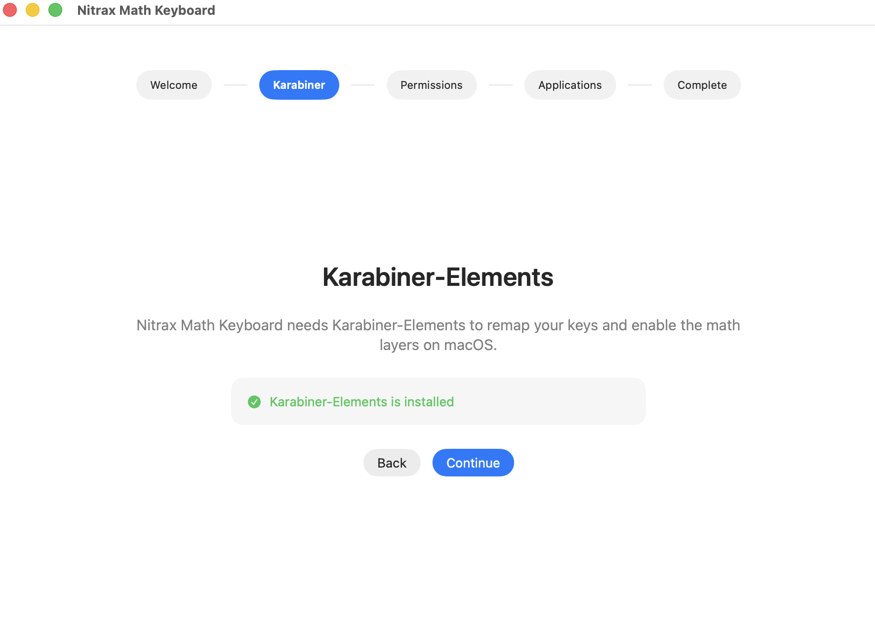 Karabiner-Elements installation step inside the Nitrax Math Keyboard macOS setup assistant